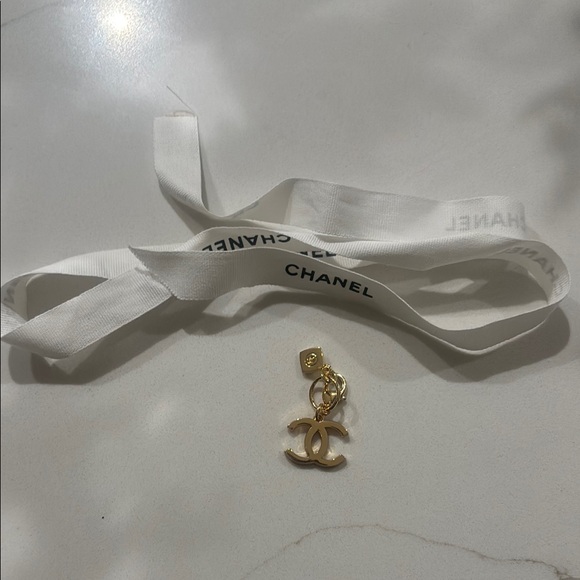 CHANEL Gold Logo Charm with White Ribbon - Picture 3 of 4